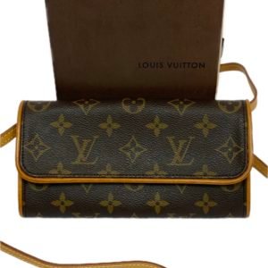 Pochette monogram Louis Vuitton