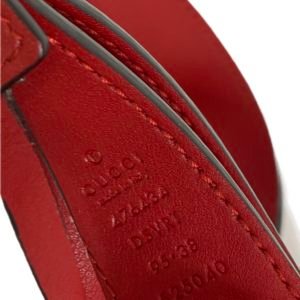 Gucci, pochette ceinture " Marmont " en cuir rouge