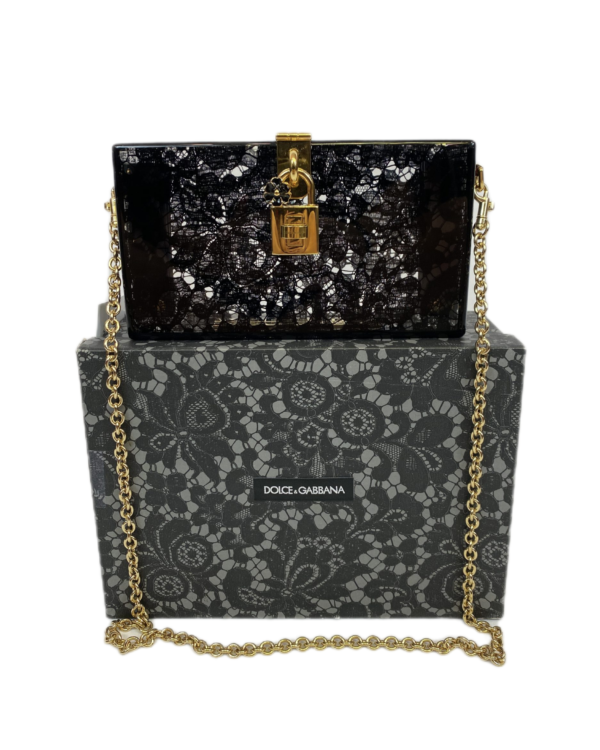 Dolce & Gabbana, Pochette Clutch motifs dentelles noir
