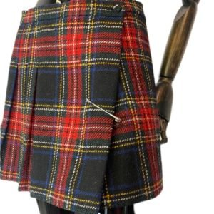 SAINT LAURENT – Mini-jupe plissée en laine à motifs écossais