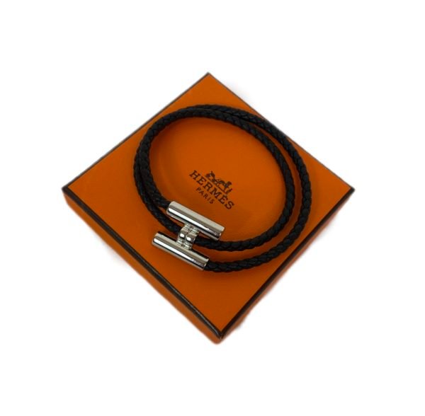 Hermès, Bracelet « Tournis » en cuir noir tressé