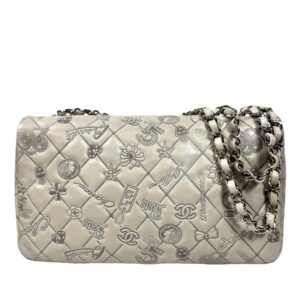 Chanel année 2011 Sac en veau matelassé taupe embossé des icônes de la Maison,