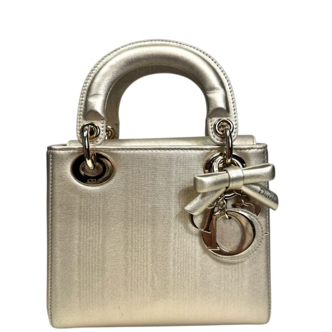 Christian Dior année 2025 Sac « Lady Dior » mini en cuir agneau laminé or